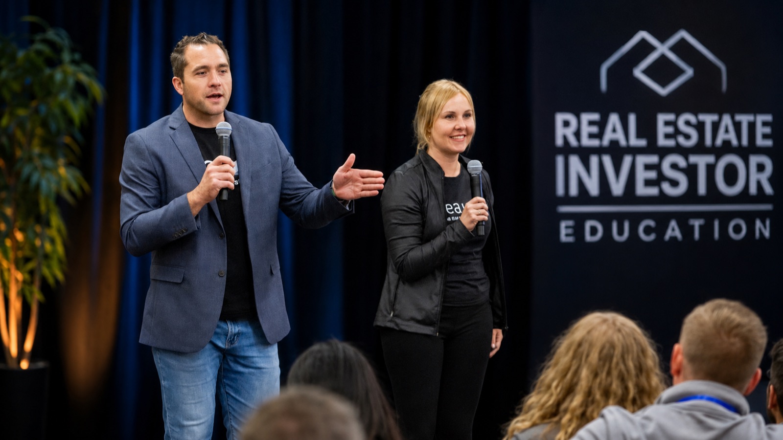 Nick Beveridge and Jo Turner teaching at a North Idaho real estate investor education event